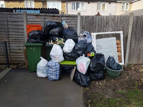 Enclosed skip placed in a residential area of Hornsey