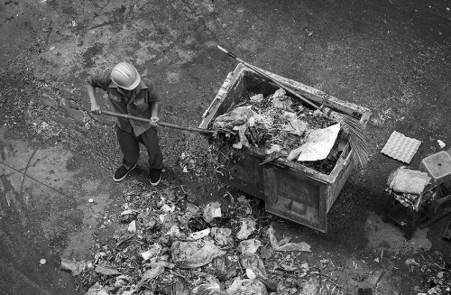 Construction site with a builders skip in Hornsey