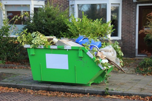 Construction debris being loaded for removal in Hornsey